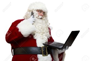 5226143-Santa-Claus-with-modern-technology-Stock-Photo-christmas